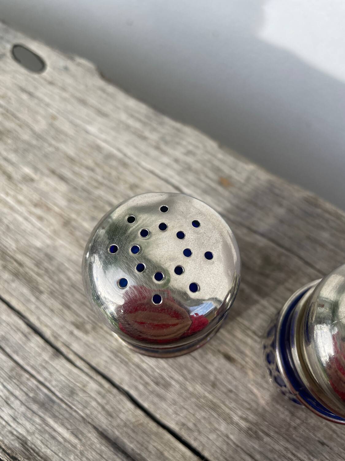 Silver-plated metal and blue glass salt and pepper shaker
