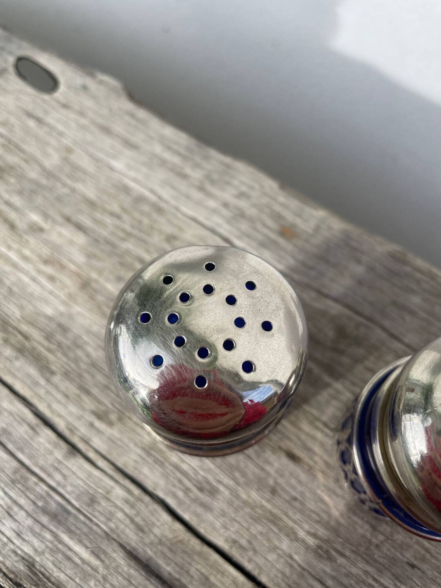 Silver-plated metal and blue glass salt and pepper shaker