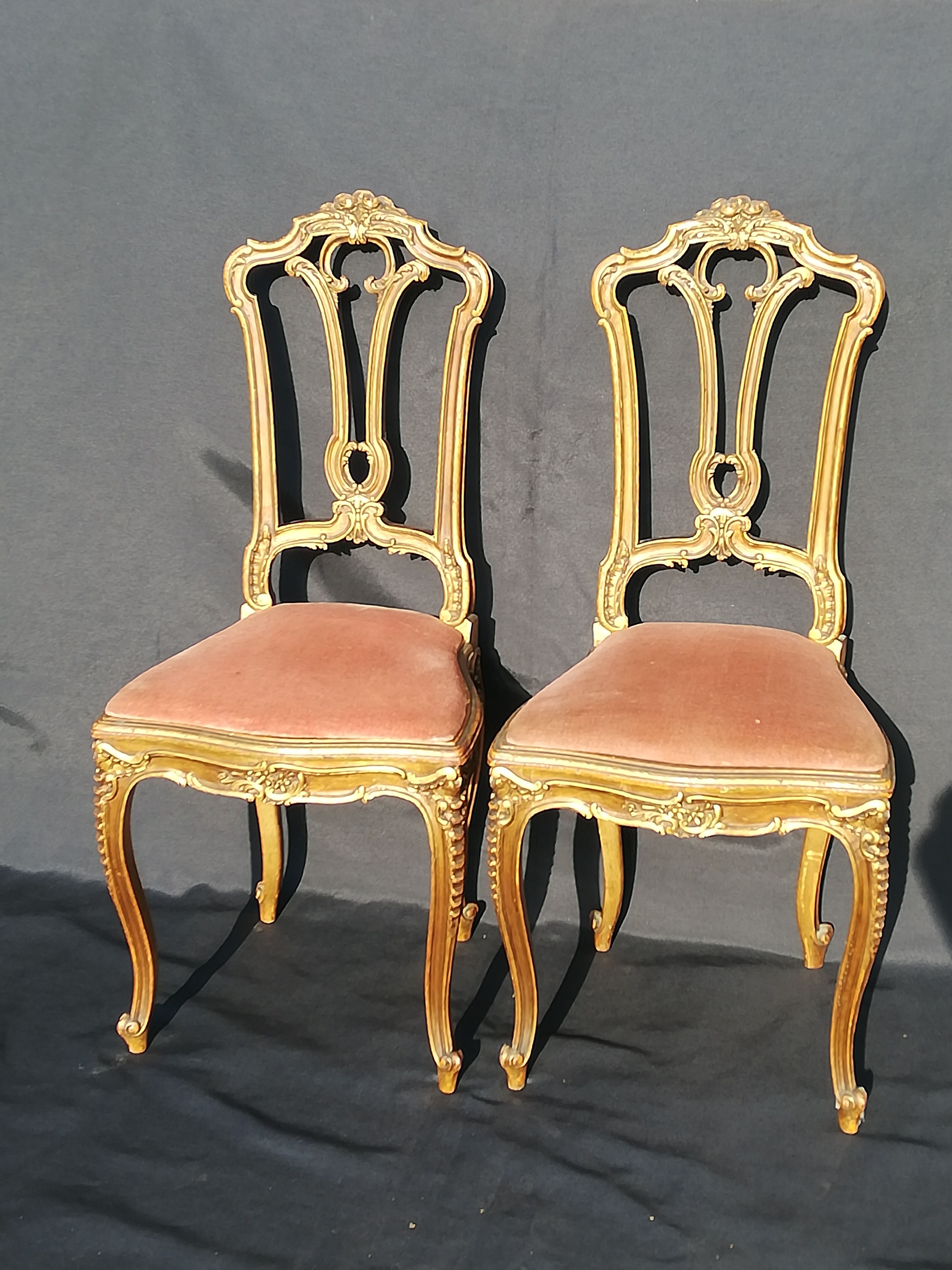 Pair of old canne chairs in gilded wood
