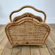 Magazine holder / Pine hutch in rattan, bamboo and canning 70s