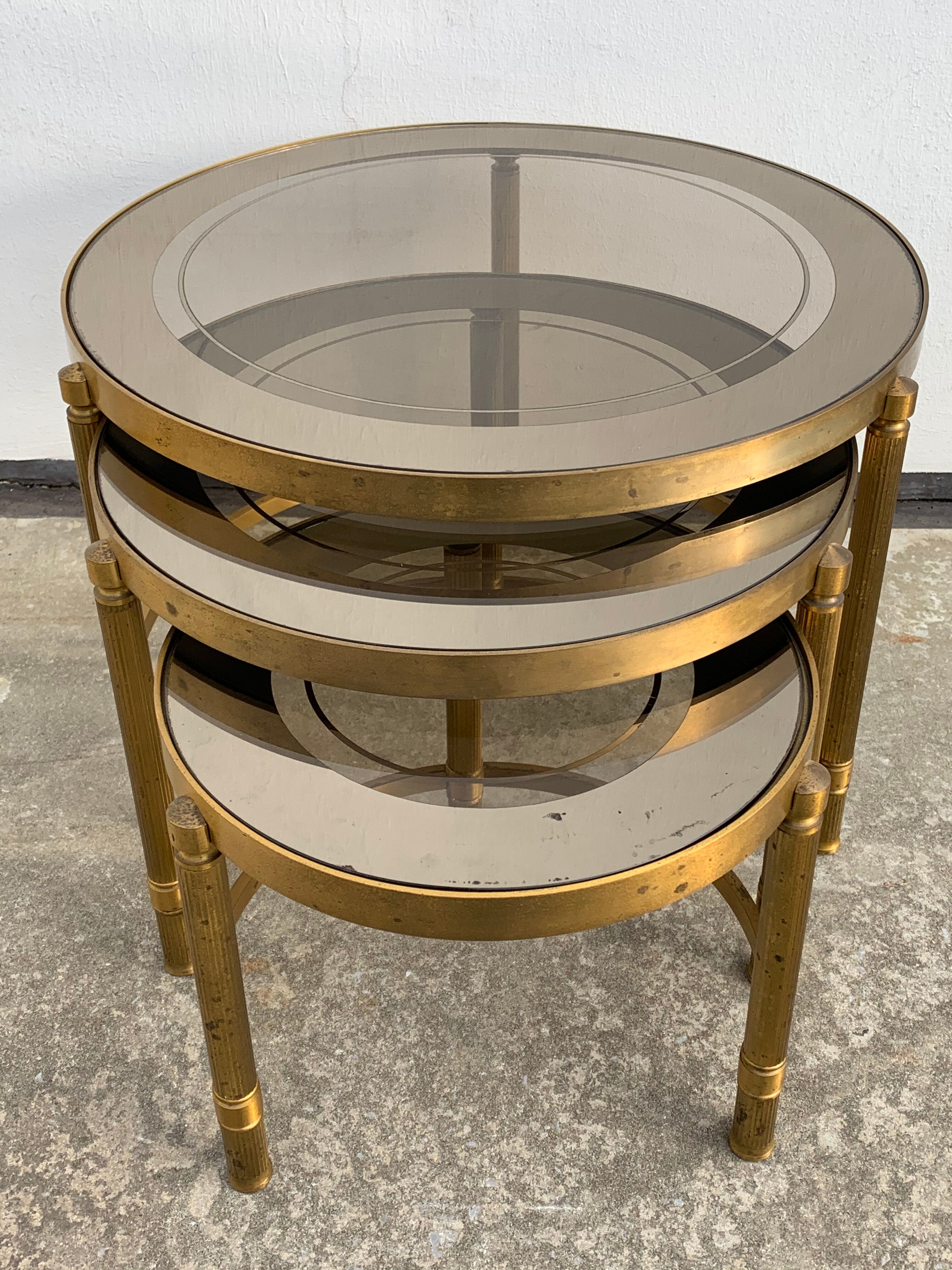 Three round brass tables 1970