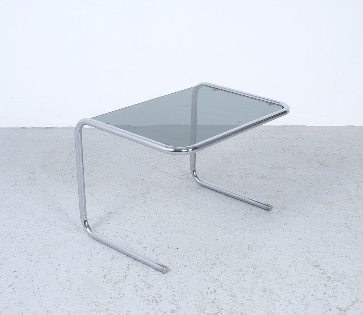 Vintage chromed nesting tables with smoked glass