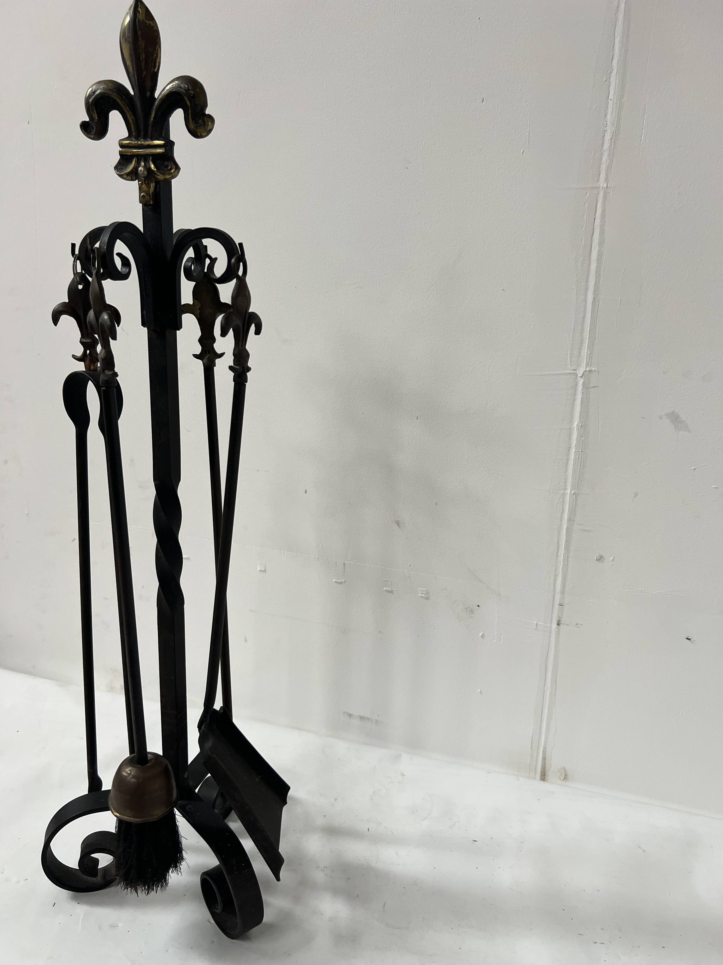 20th century wrought iron and bronze fireplace set