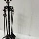 20th century wrought iron and bronze fireplace set