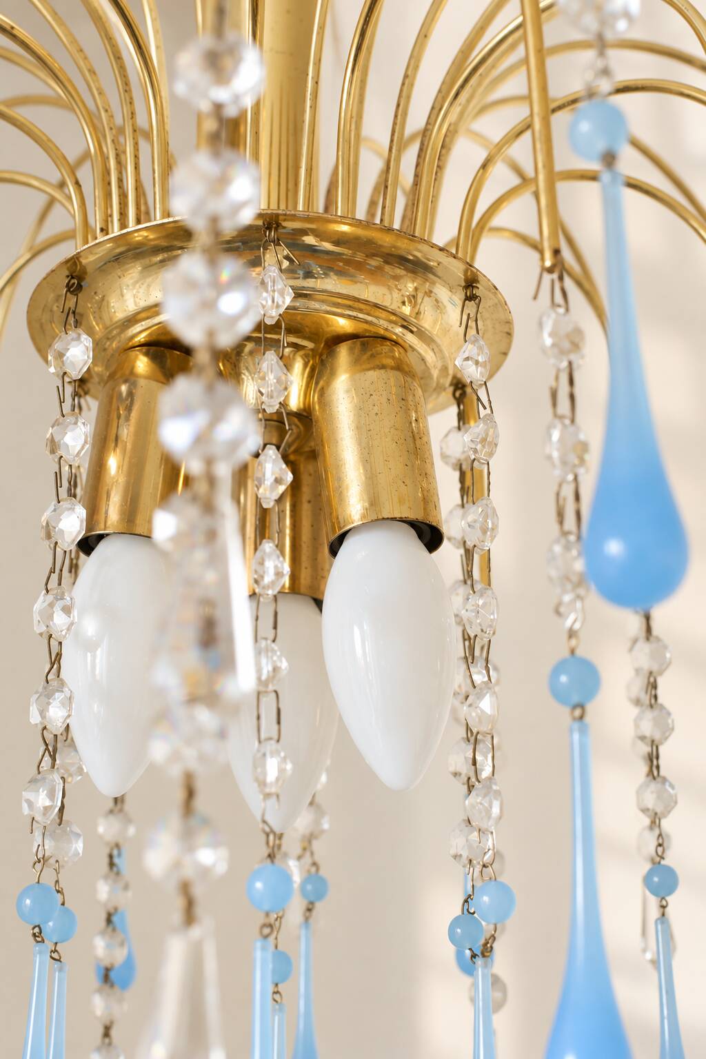 Vintage chandelier with blue Murano glass pendants.