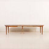 Henning Kjaernulf attributed extra large teak table with 4 inner leaves for Soro, Denmark 1960s