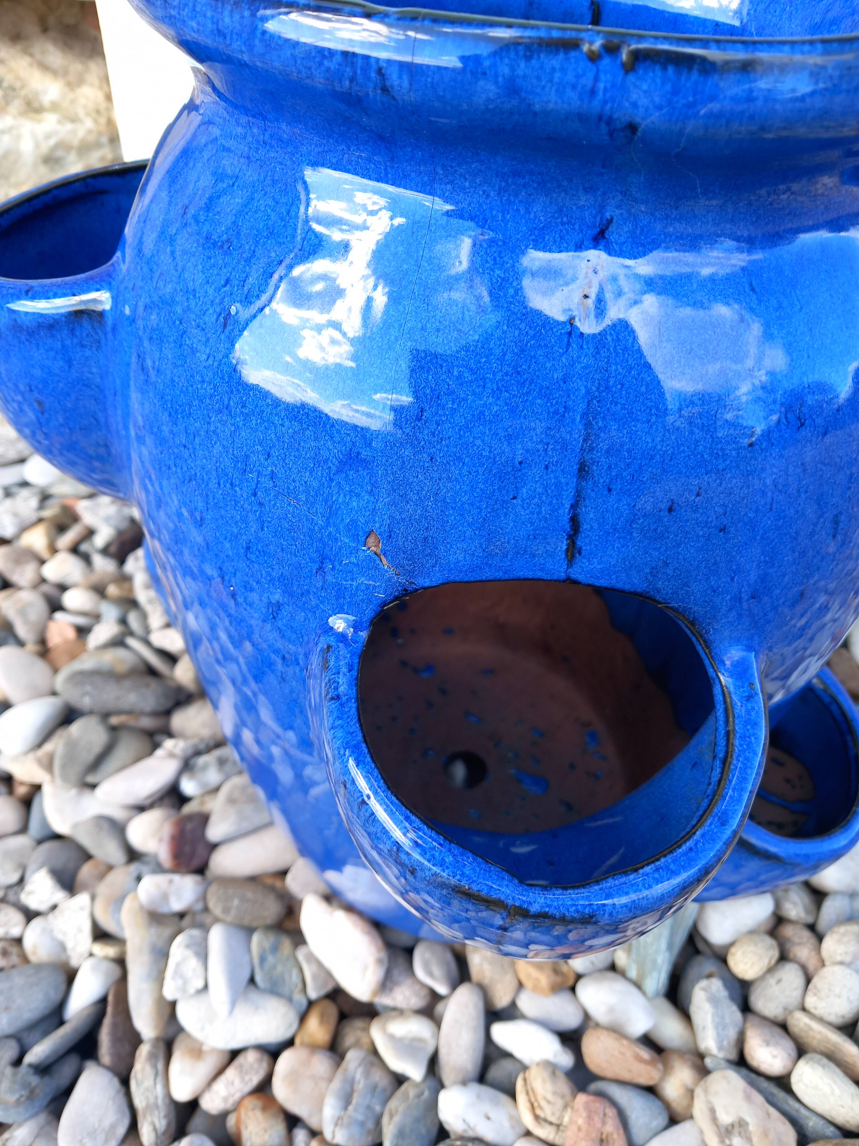 Blue glazed terracotta strawberry pot