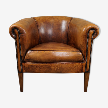 Compact club armchair in sheep leather