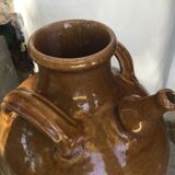 Varnished oil jug