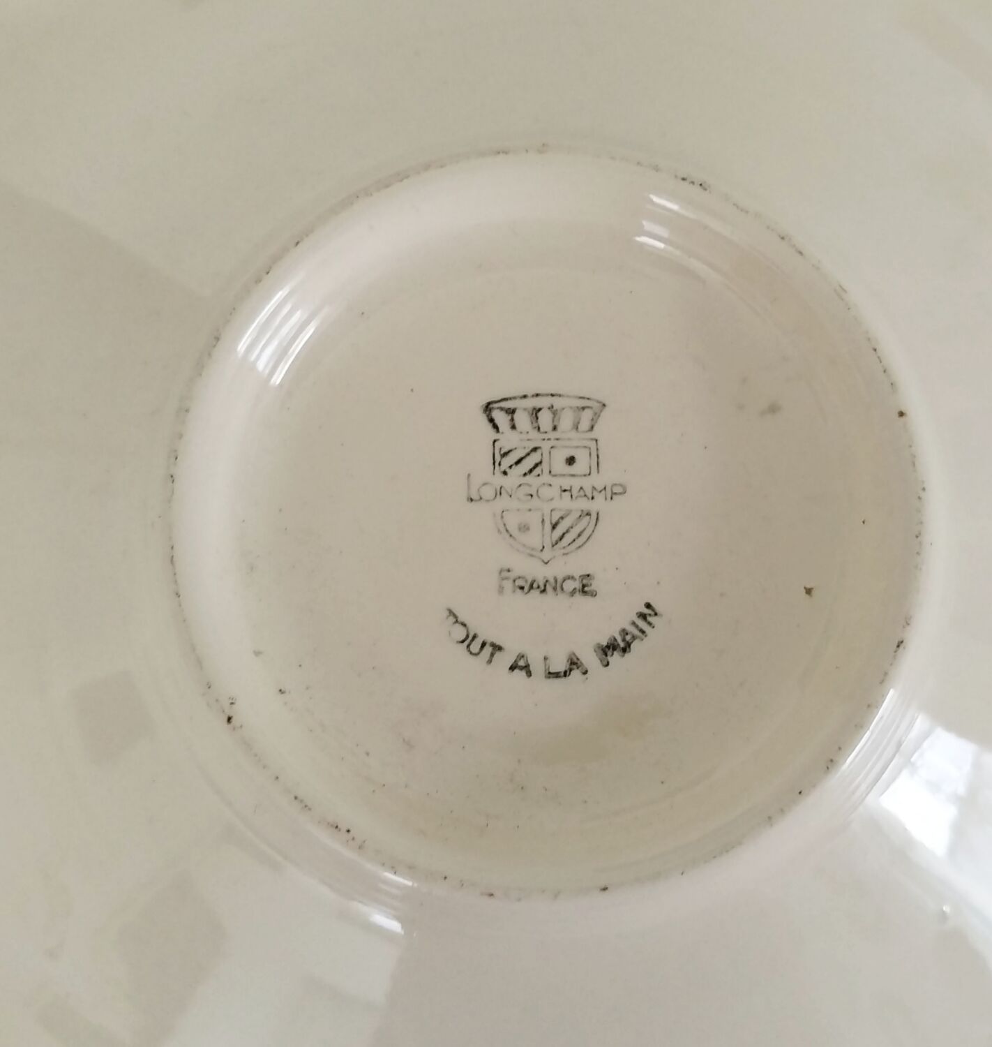 Round hollow Longchamp Agen plate