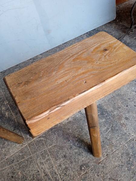 Pair of low stools in old patinated solid wood