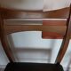 5 Scandinavian style chairs, wood and black faux leather.
