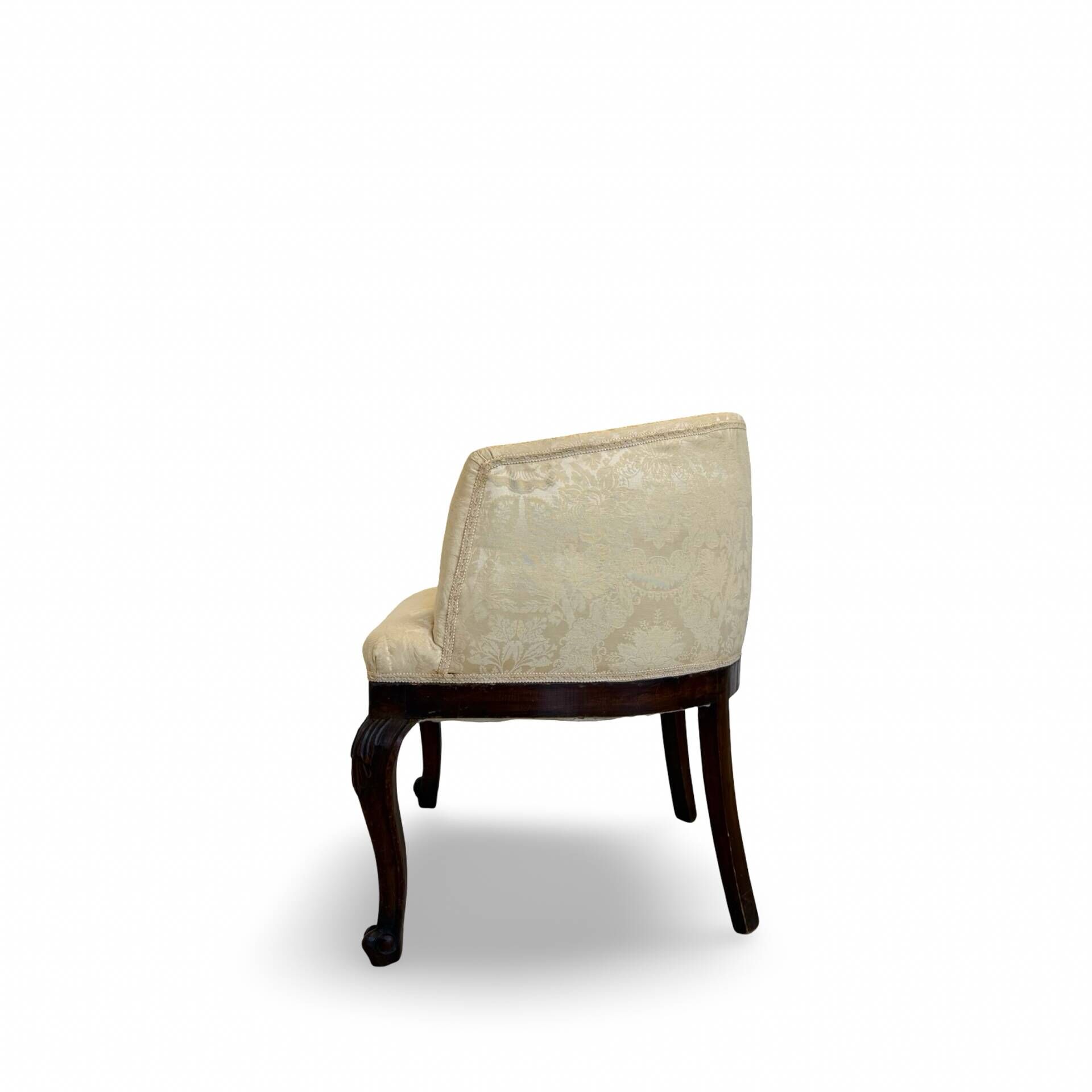 An antique Italian bar chair and a matching tufted vanity stool.