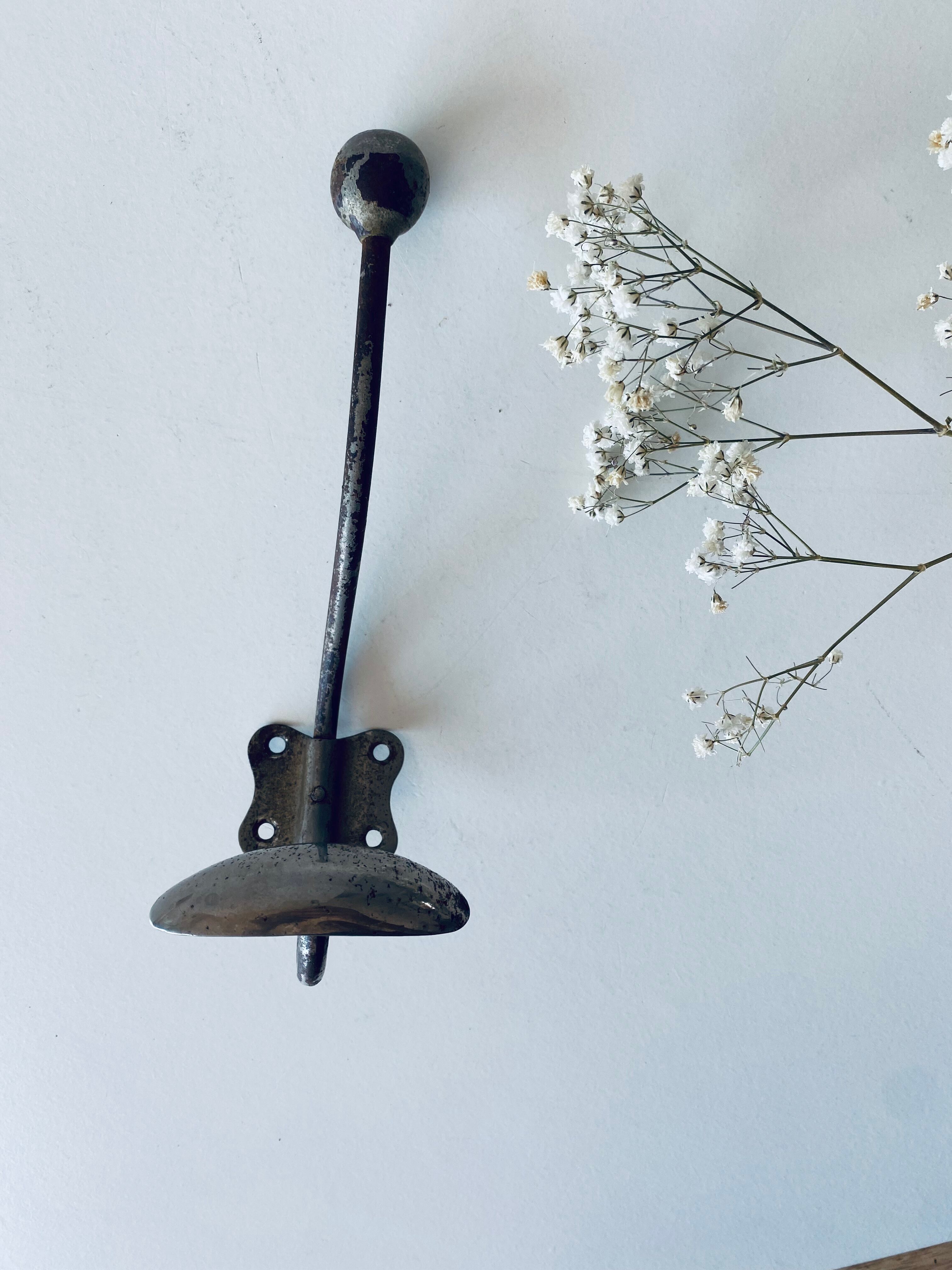 Ancient metal patère