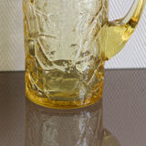 Pitcher in crumpled glass
