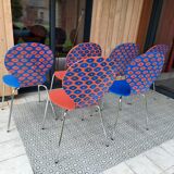 Blue and terracotta ant chairs with eye pattern