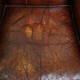 Characterful vintage design armchair made from beautifully patinated sheepskin