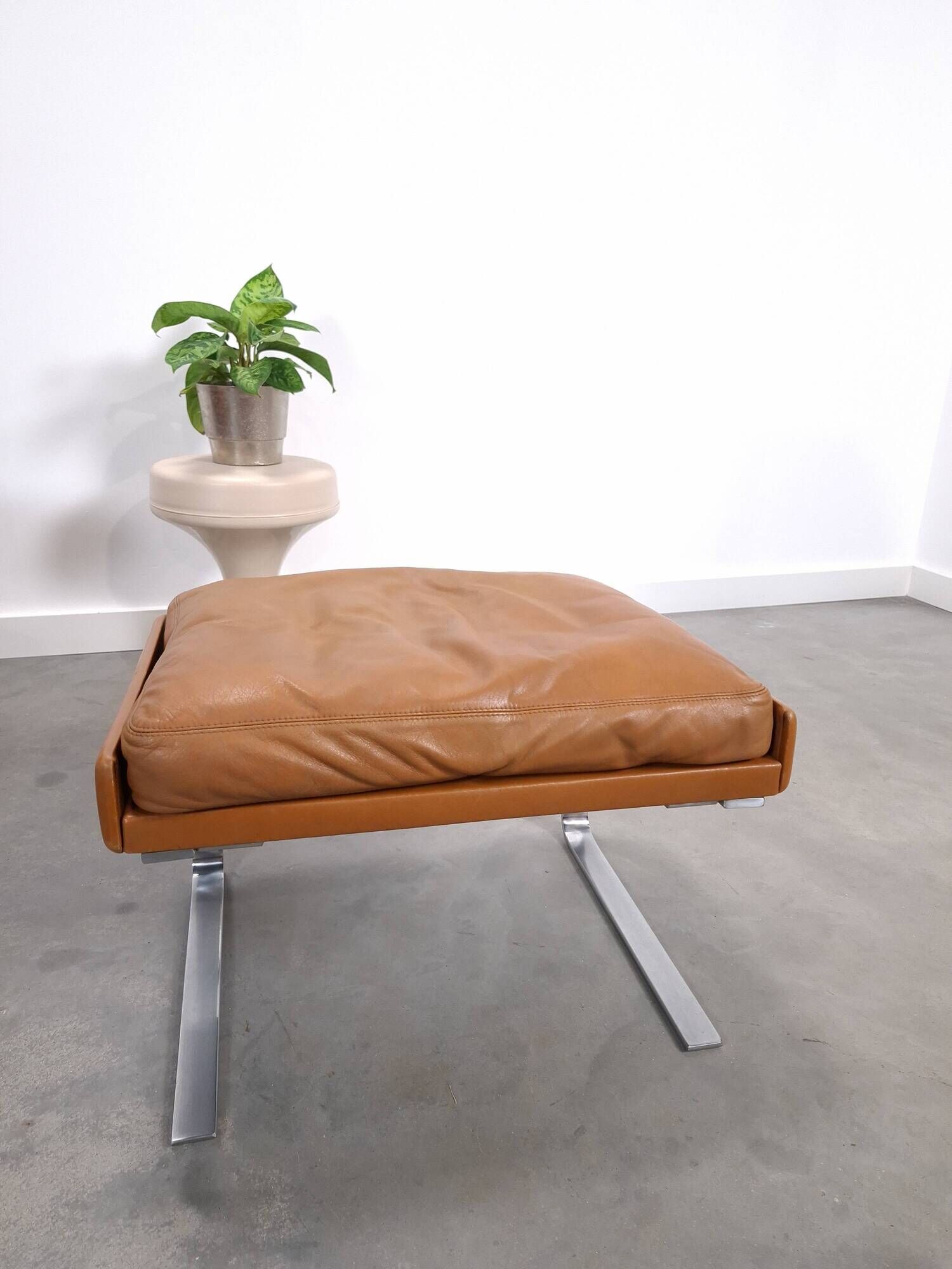 Vintage COR Swing armchair with ottoman, Reinhold Adolf, cognac leather