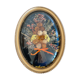 Cadre ovale fleurs séchées noeud velours