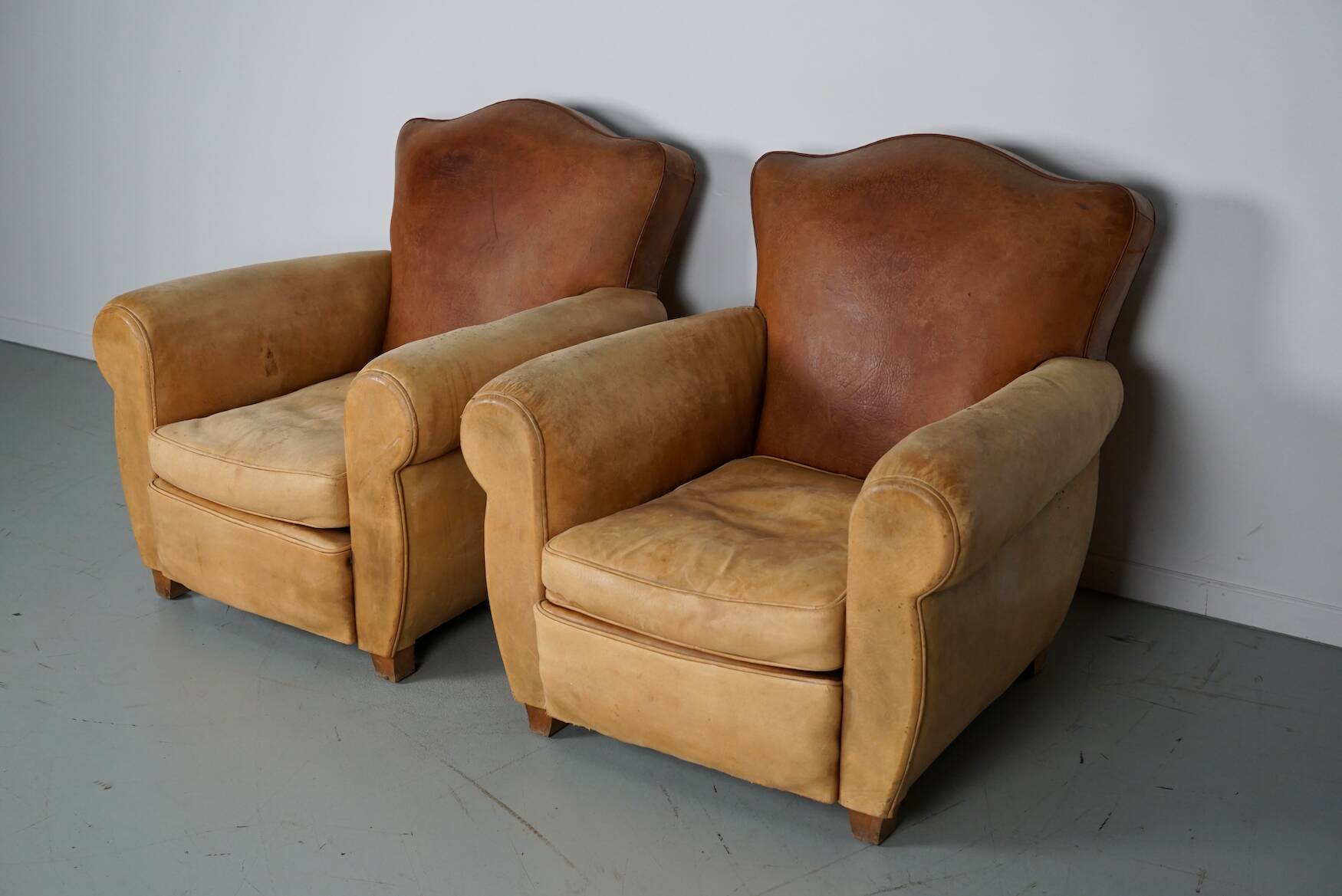 Pair of French Cognac Moustache Back Leather Club Chairs, 1940s