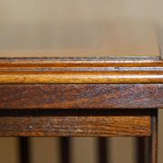 Sheraton Revival rotating library table in walnut and satin wood.
