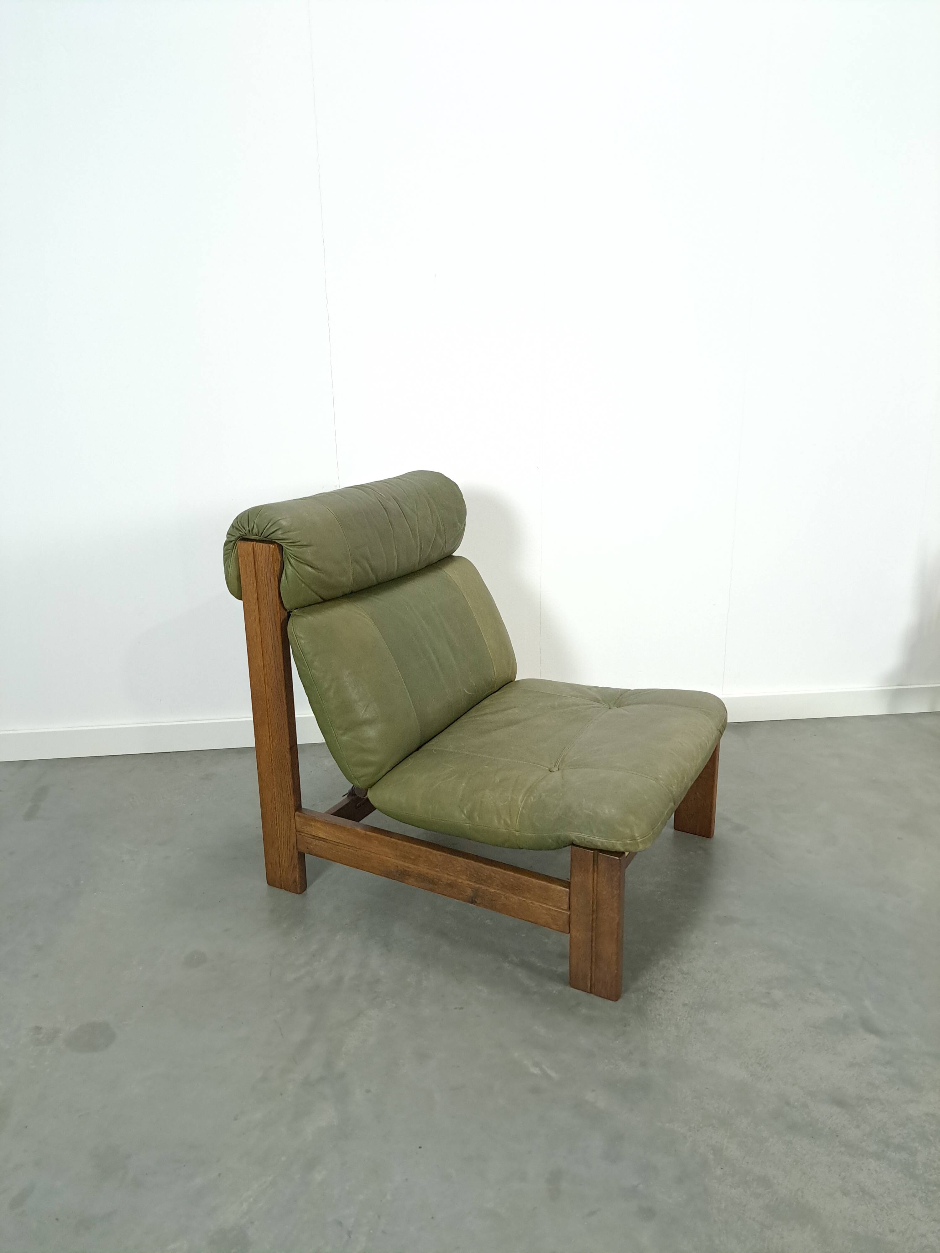 Green leather and oak wood armchair