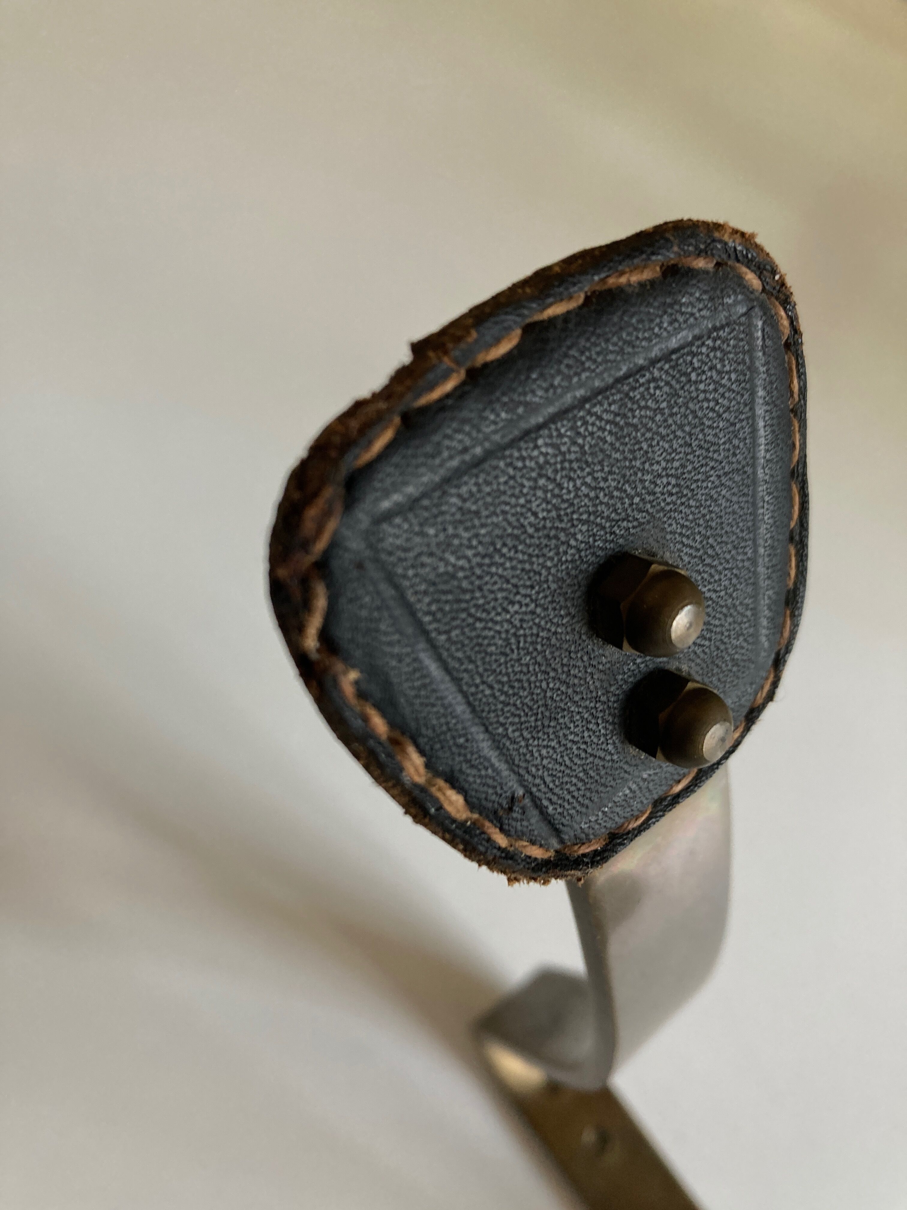 Adnet hook in bronze and leather 1950