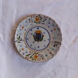 Old plate with coat of arms