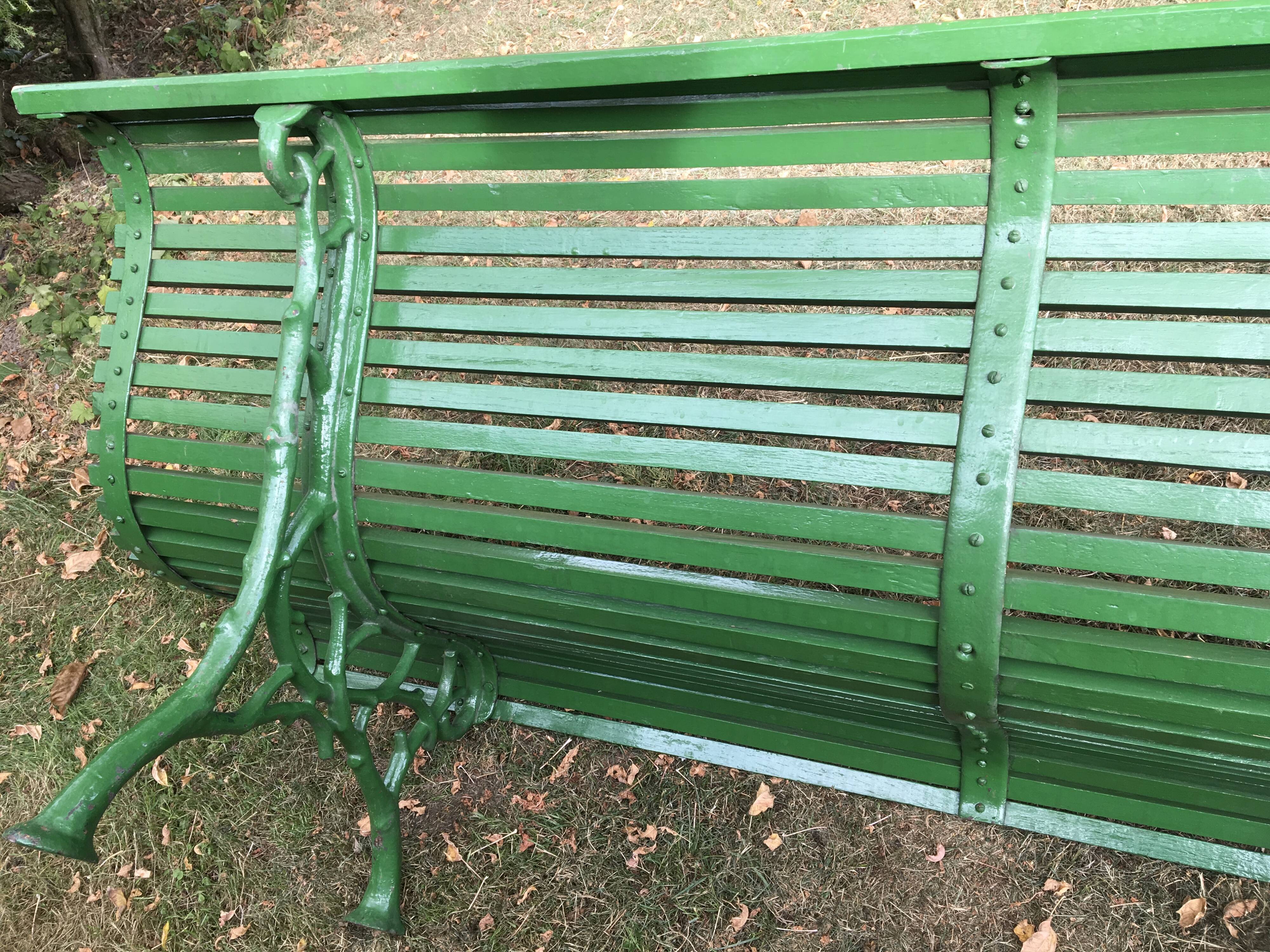 Garden bench in oak and foot in cast iron
