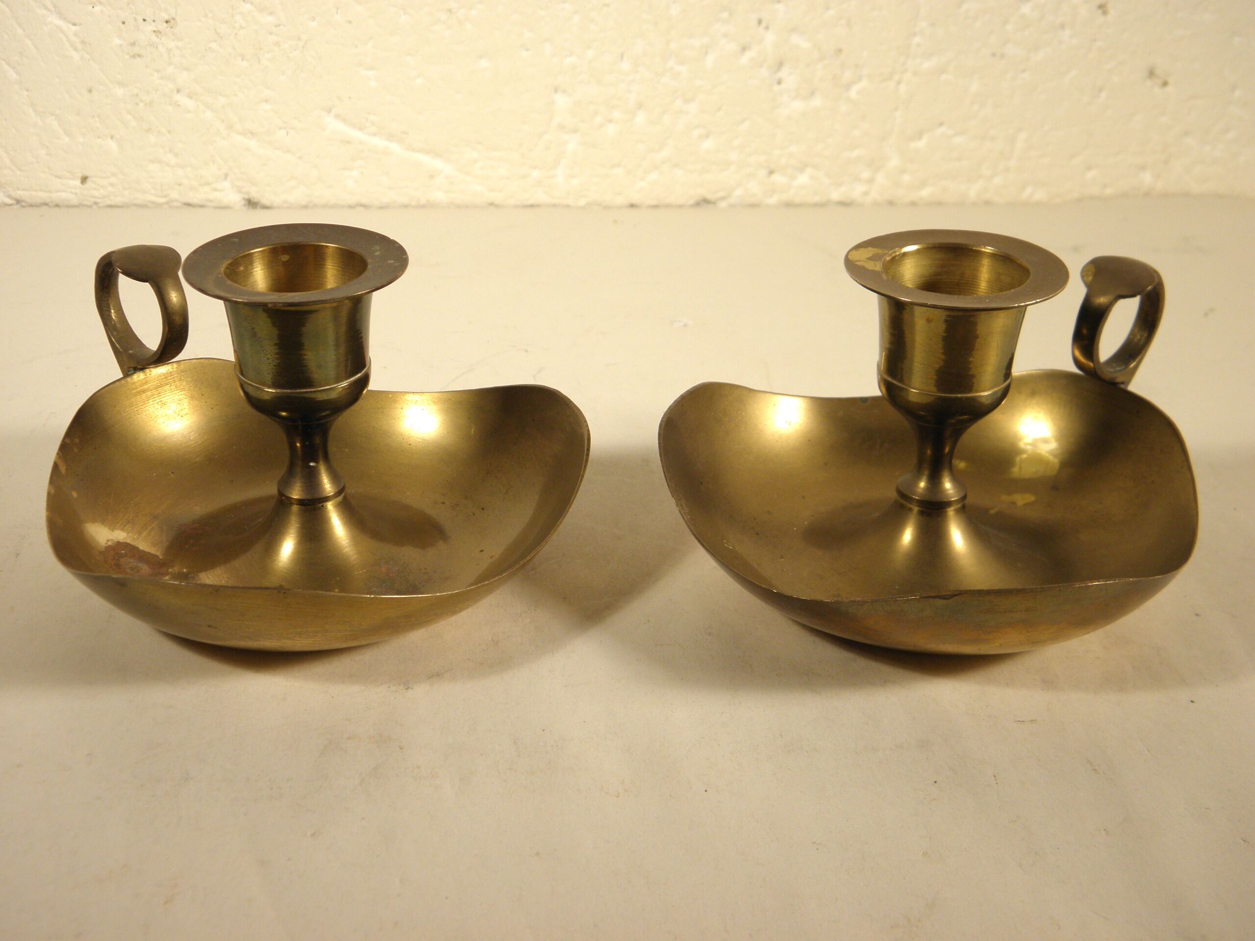 Pair of brass candle holders