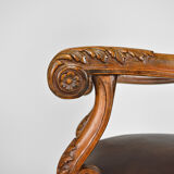 Louis XIII office armchair in leather and walnut carved around 1860