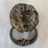 Bronze lion door knocker