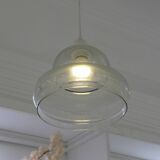 Suspended lamp in transparent blown glass, modern, minimalist, timeless style.