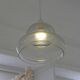 Suspended lamp in transparent blown glass, modern, minimalist, timeless style.