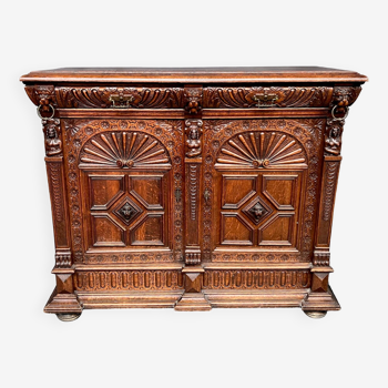 Renaissance style chest of drawers. Carved oak.