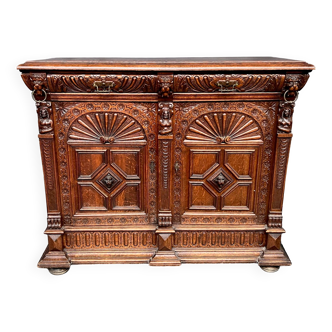 Renaissance style chest of drawers. Carved oak.