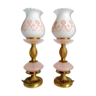 Duo of pink opaline relief lamps and gilded bronze