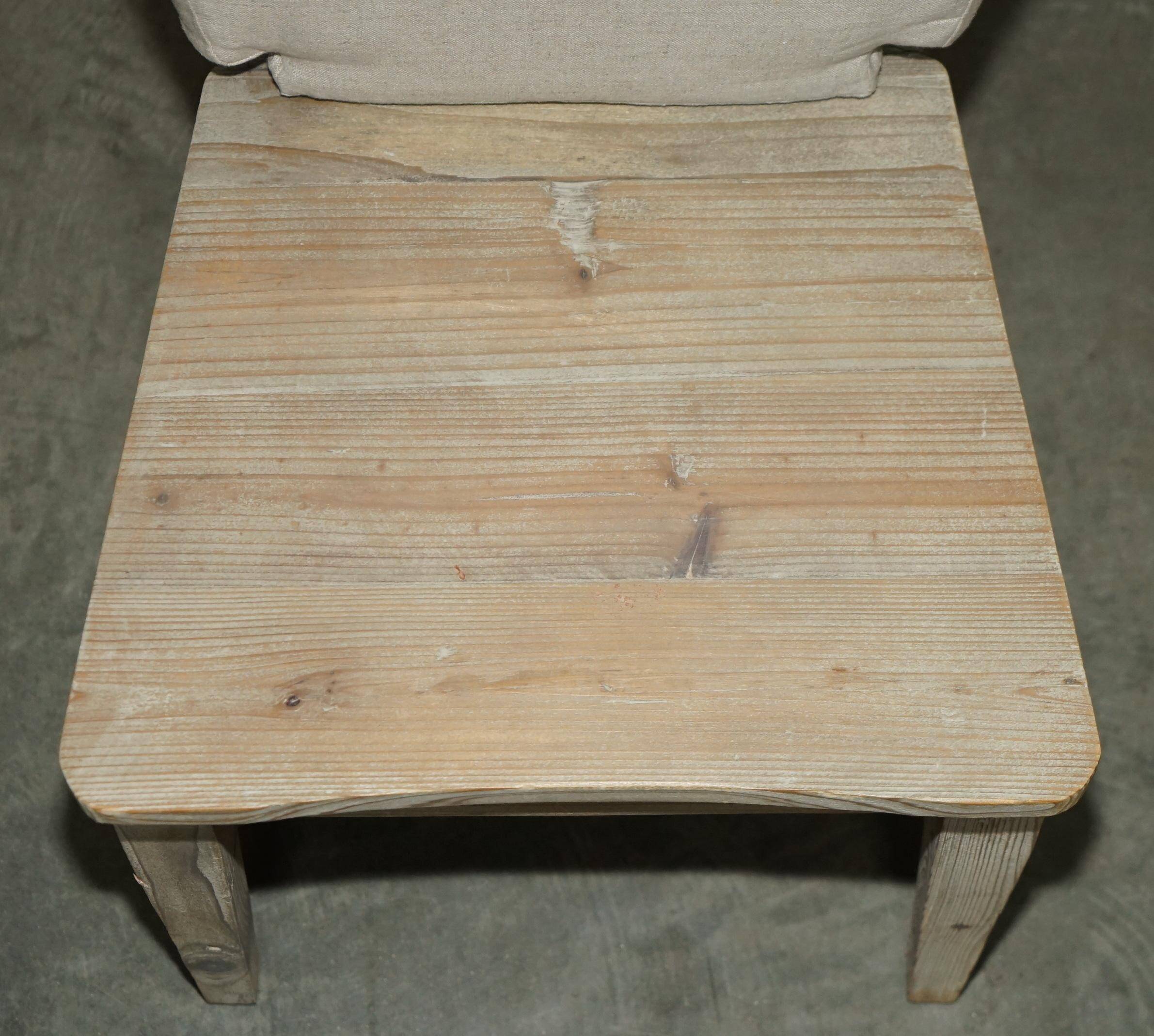 Pair of Swedish-style accent chairs in recycled pine with upholstered seats.