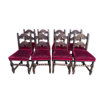 Suite de 8 chaises de style Louis XIII chêne et velours rouge