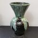 Old black enamelled ceramic Gaubier vase with green white vintage drips