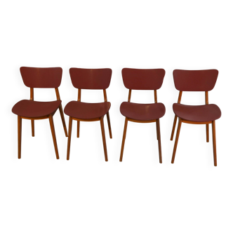 Ensemble de 4 chaises design chêne et skaï rouge 1960's