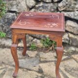 Coffee table in brass marquetry