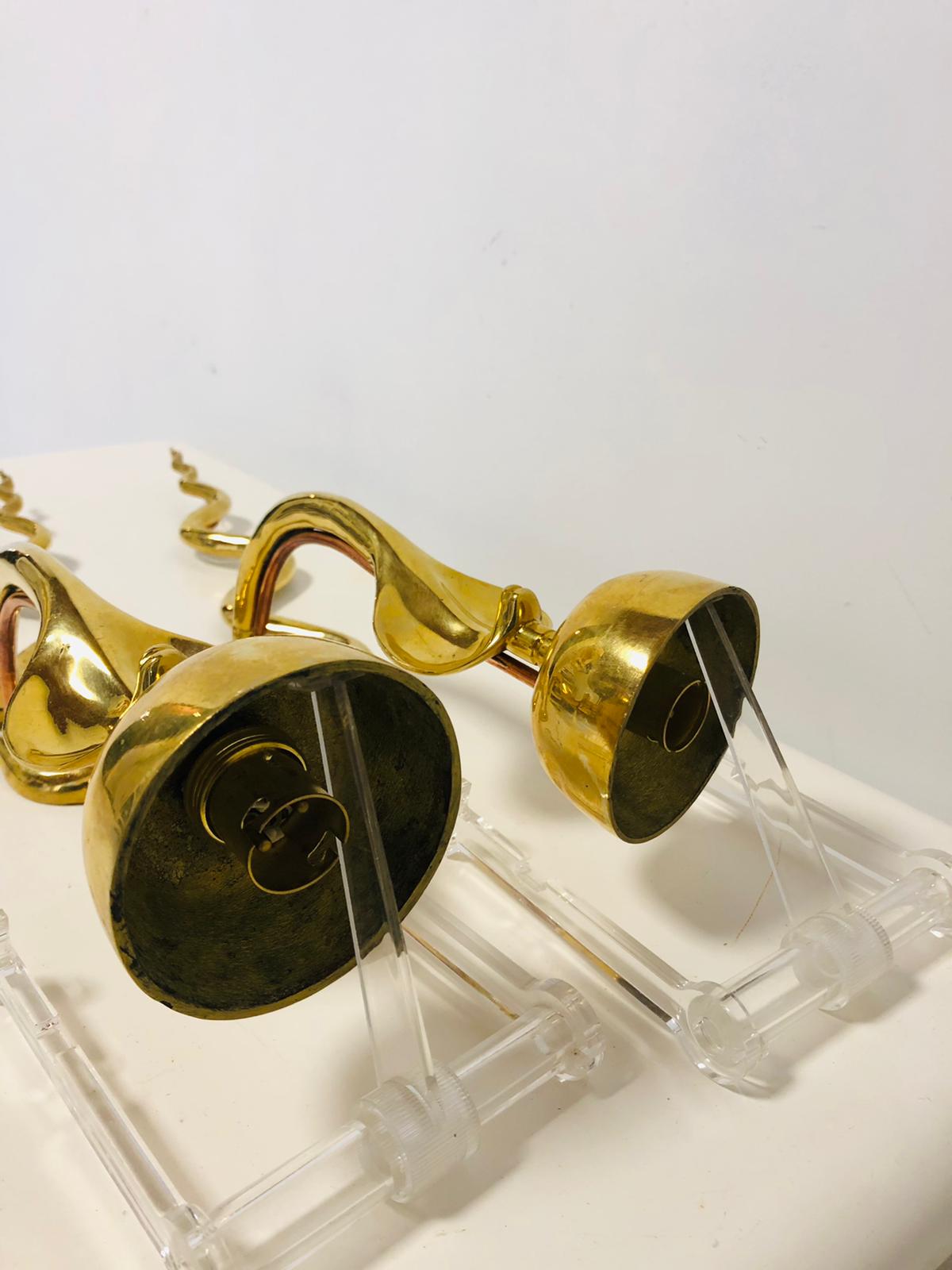 Pair of gilded bronze wall lamps