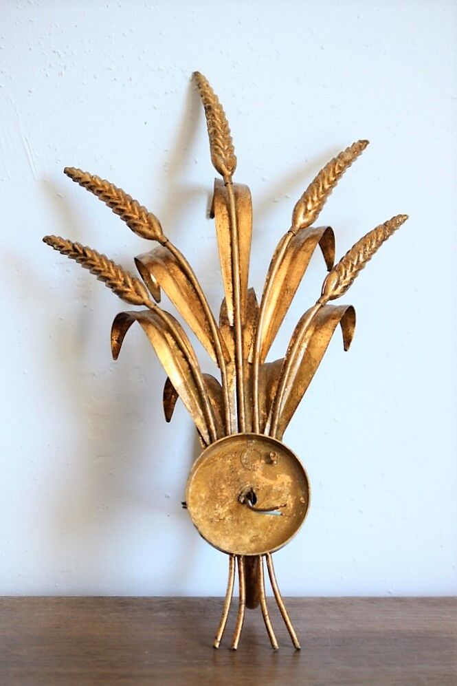 Applies "wheat sheaf" gold metal