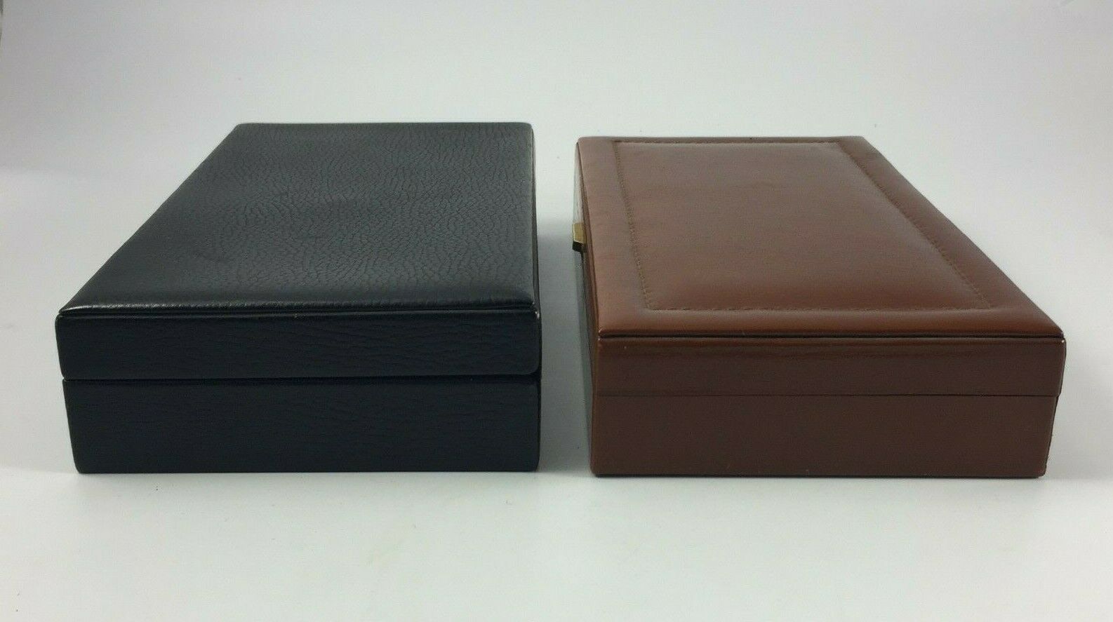2 boxes the leather tanner box has games and box a cigars