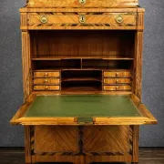 Secretary from the Louis XVI era in precious wood marquetry.