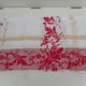 Nappe damassée bande rouge