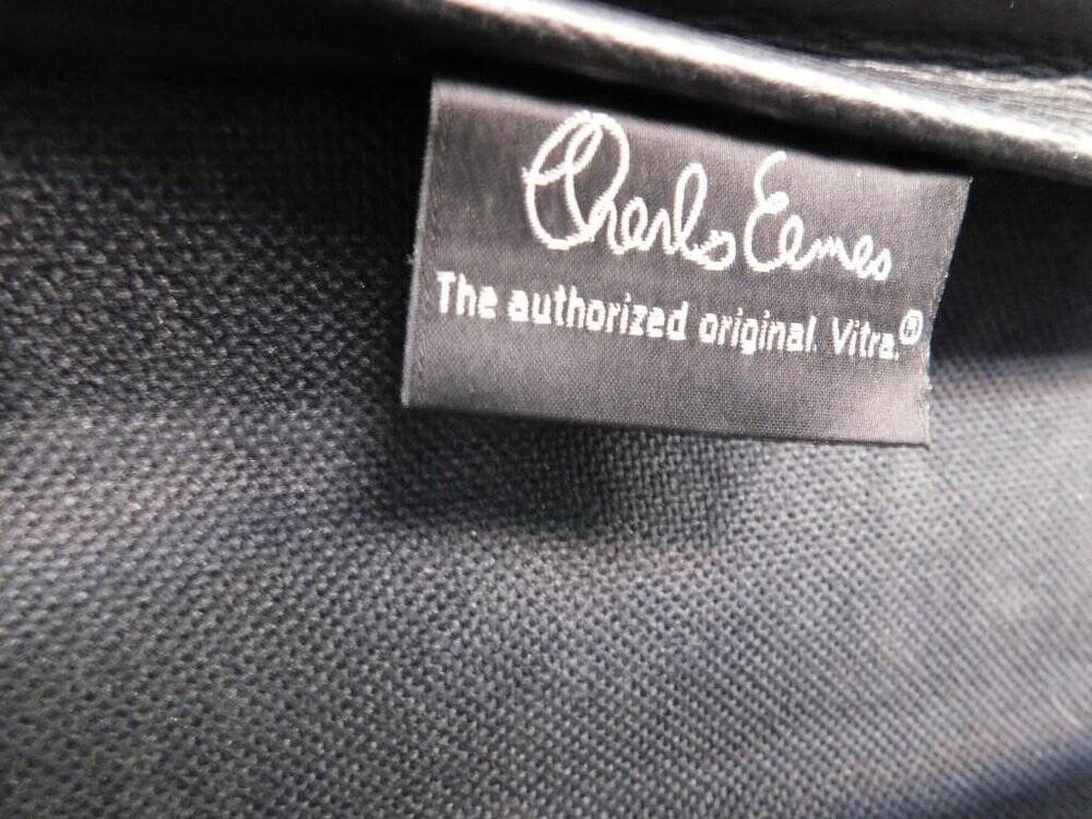 Vintage chair by charles eames ea 108 black leather edition vitra denmark