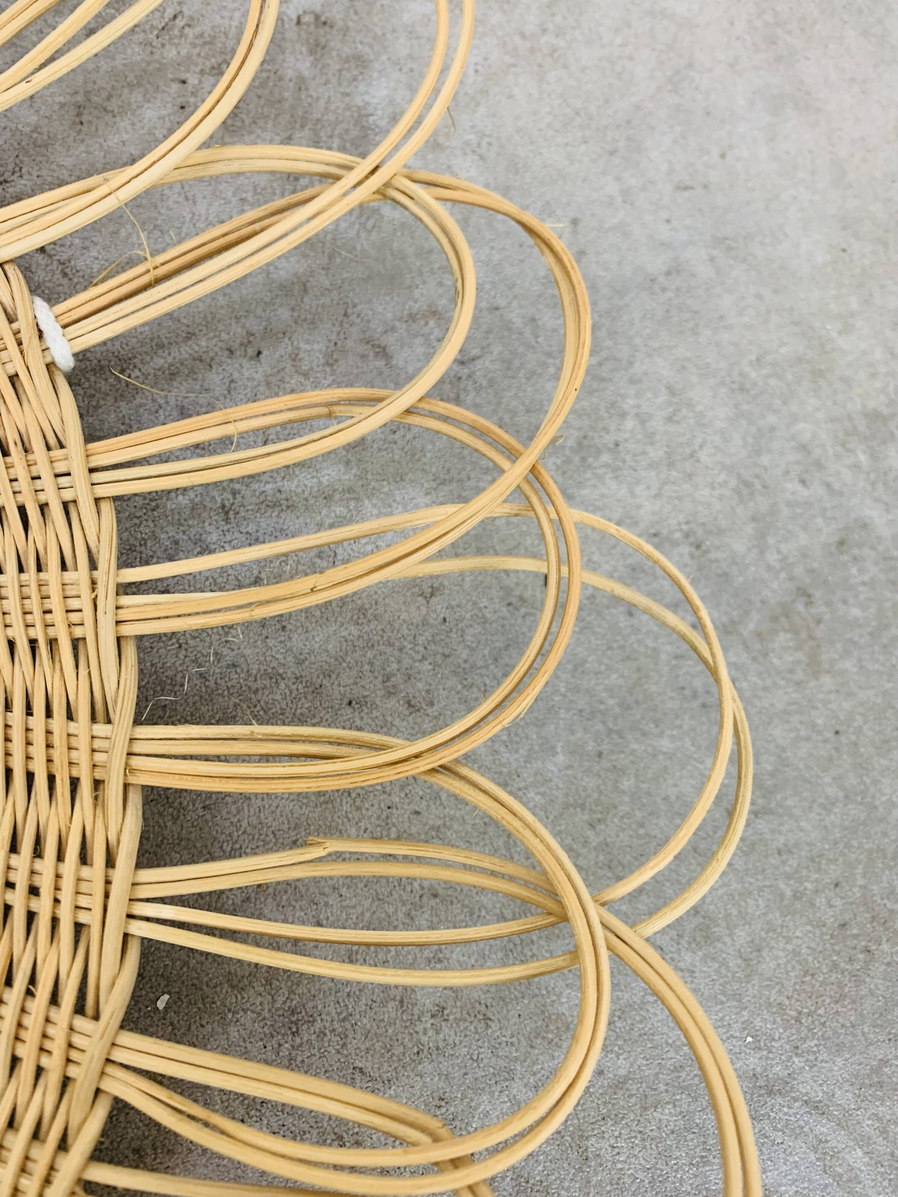 Vintage rattan sun mirror from the 60s