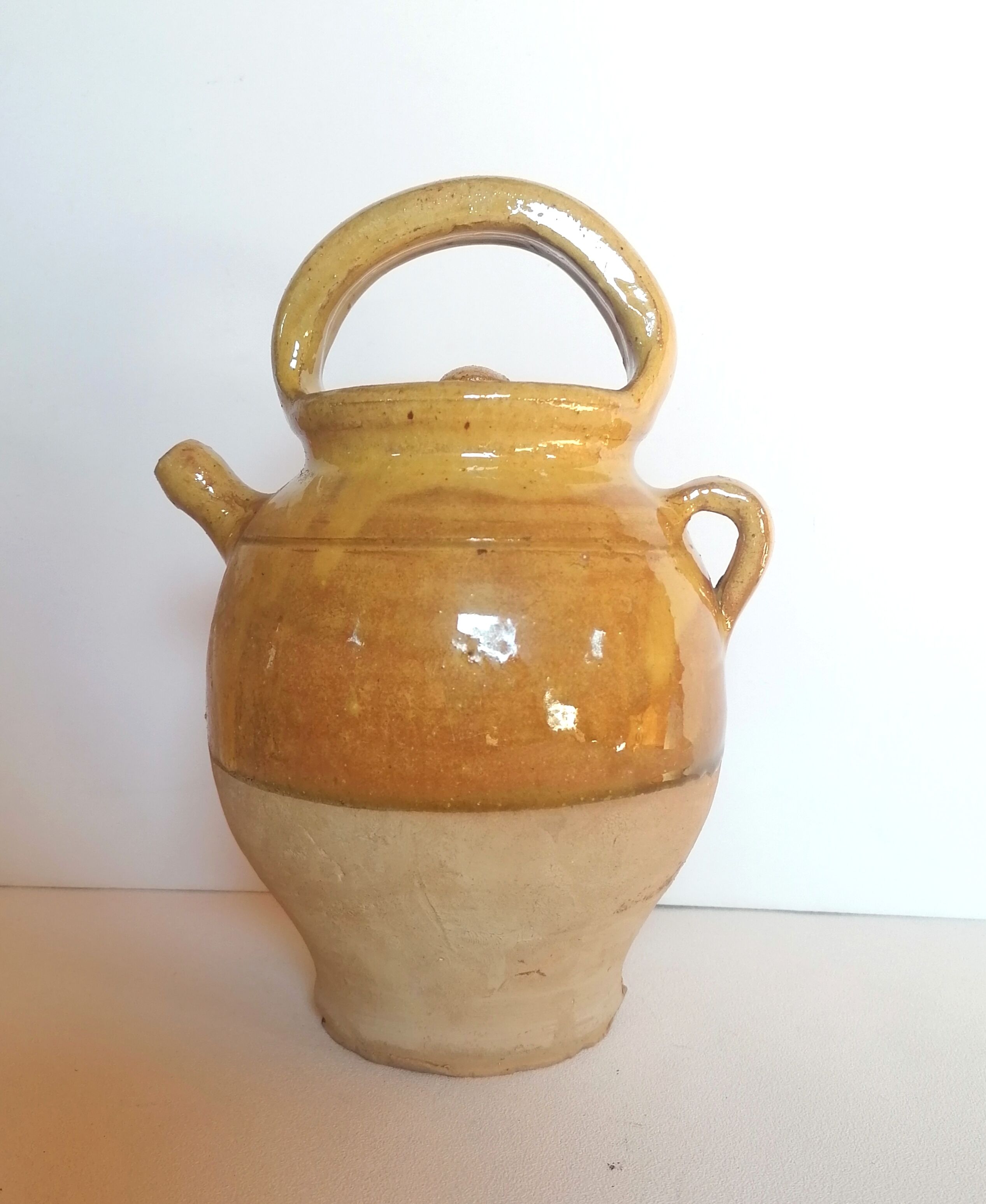 Enamelled jug with lid